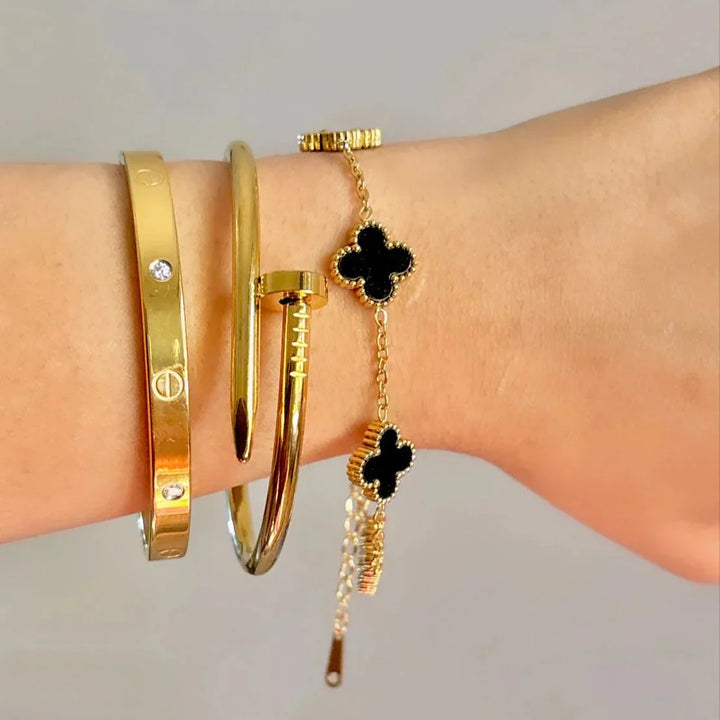 SET 4 ARMBÄNDERN SCHWARZ MIT GOLD EDITION