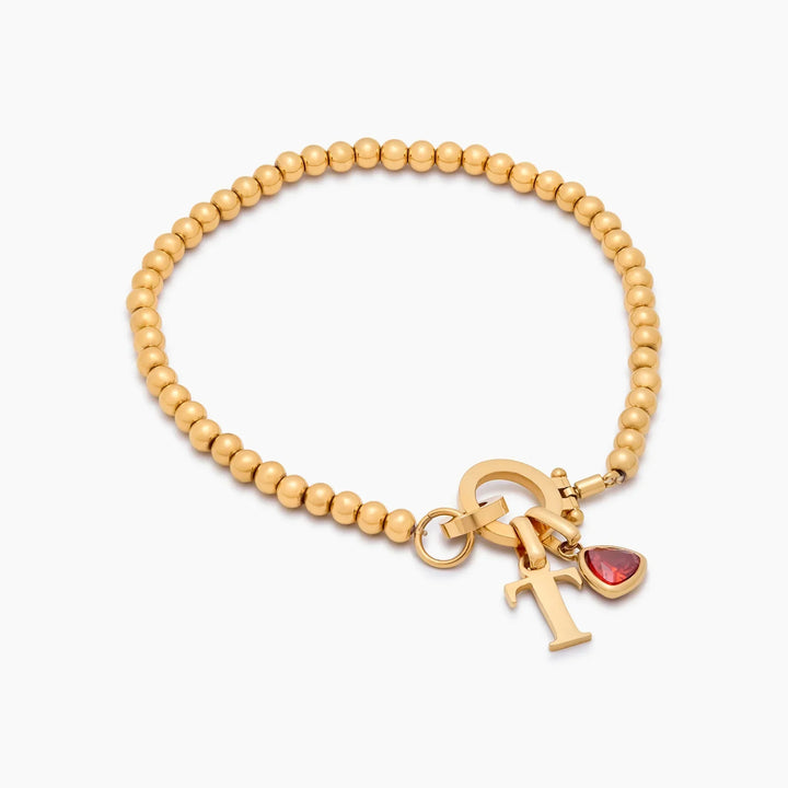 Perlen-Armband mit Geburtsstein und Initialen-Anhänger